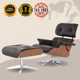 Black lounge chair with ottoman on a beige background with quality and warranty badges.